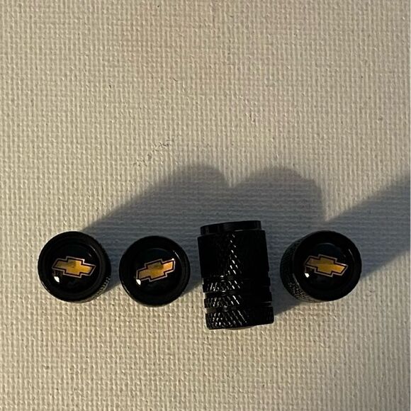 Chevrolet Logo valve Stem caps in black set of 4 NWT - Picture 1 of 5